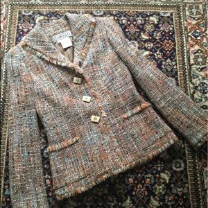 Linton Mills tweed jacket for a smart-chic woman.